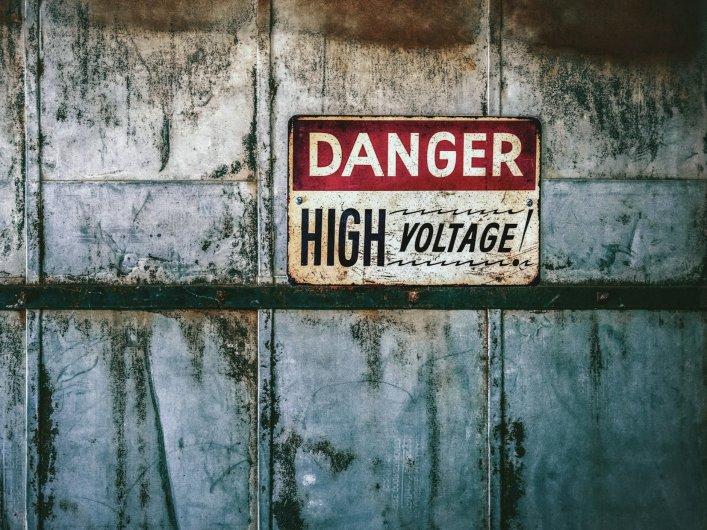 Illustration featuring a signage stating Danger High Voltage