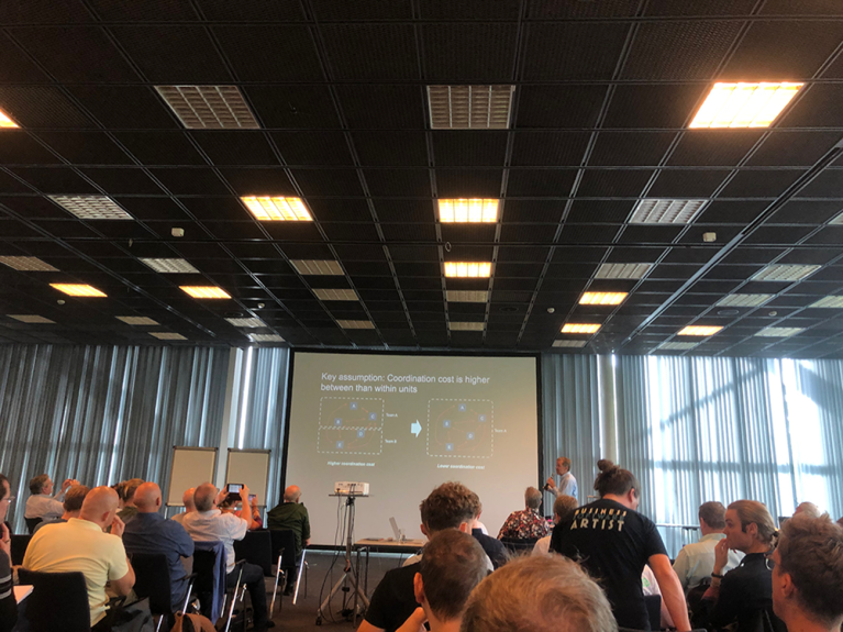 Image showing keynote with title: When should you integrate roles in the same team – and when should you separate them? by Nicolai Worren