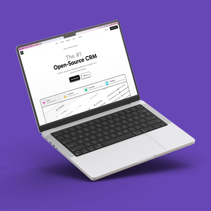 Ein schwebender Laptop vor lila Hintergrund zeigt eine CRM-Webseite als Teil der JOCI Leistungen